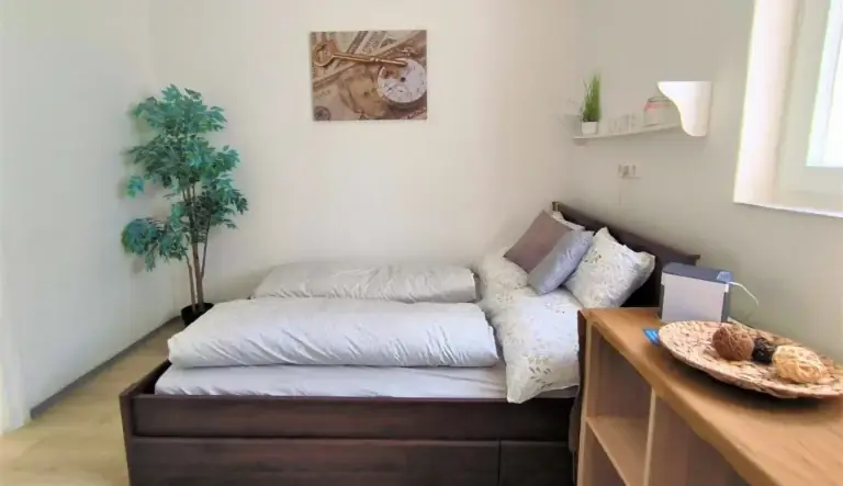 Caesar Residence apartman franciaágyas szobája