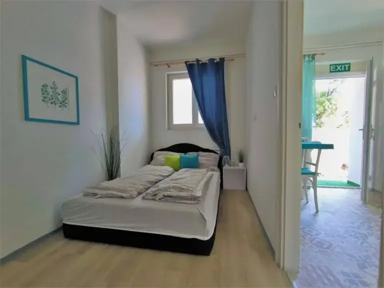 Caesar Residence apartman hálószobája franciaággyal